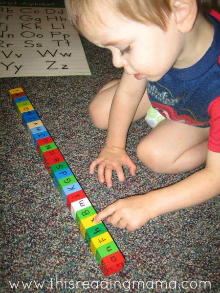 writing letters on DUPLO LEGO bricks for toddlers