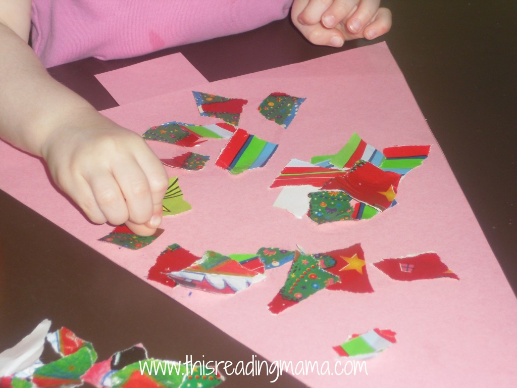 photo of gluing down torn wrapping paper onto Christmas tree