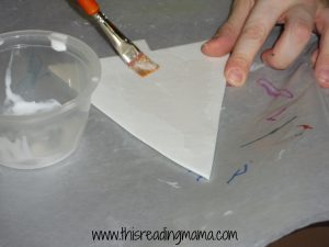 painting glue with paintbrush