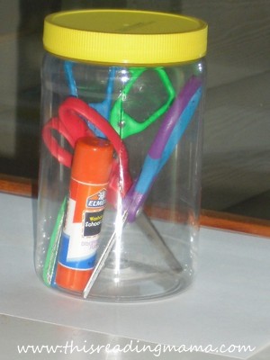 photo of peanut butter jar used for holding school supplies