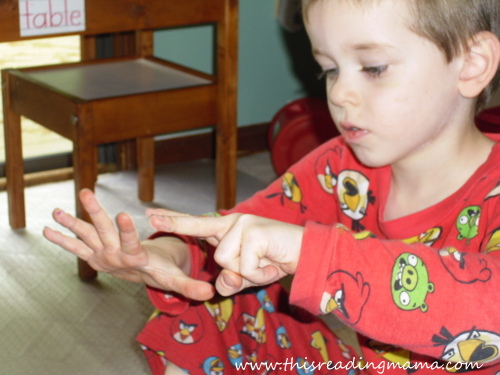 photo of Solving addition problems, counting on fingers | This Reading Mama