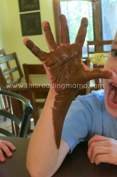Painting the hand and arm for a tree trunk and branches | This Reading Mama