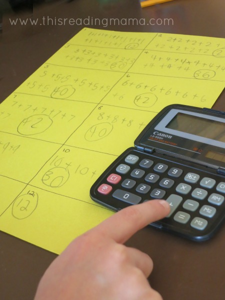 using a calculator to add sums