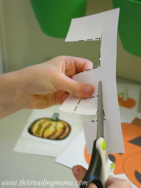 cutting out shapes with pumpkin cut it out pack
