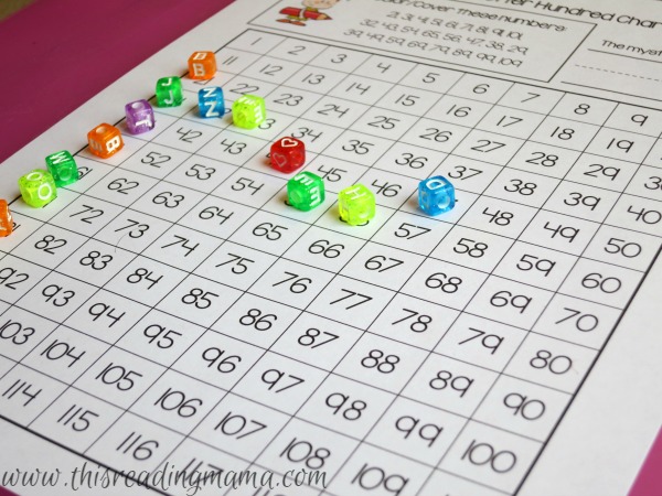 using beads to cover hundreds chart mystery letter page