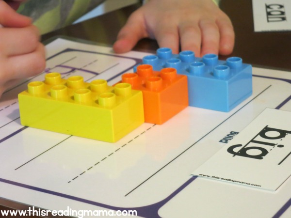 writing the word on the DUPLO handwriting mat