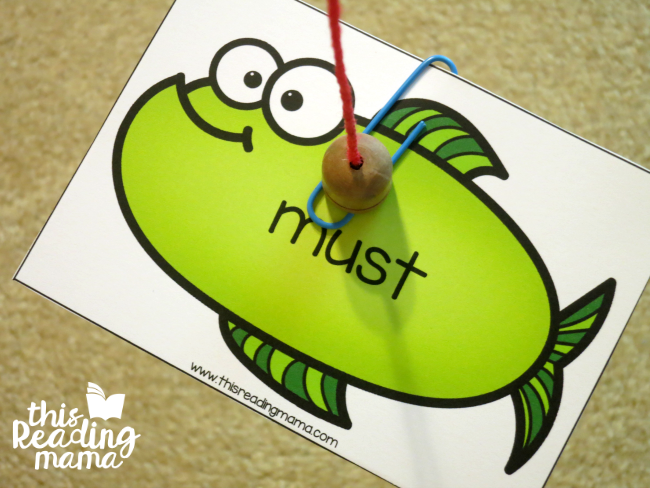 sight word fishing game - catching a fish with magnetic pole and paper clip
