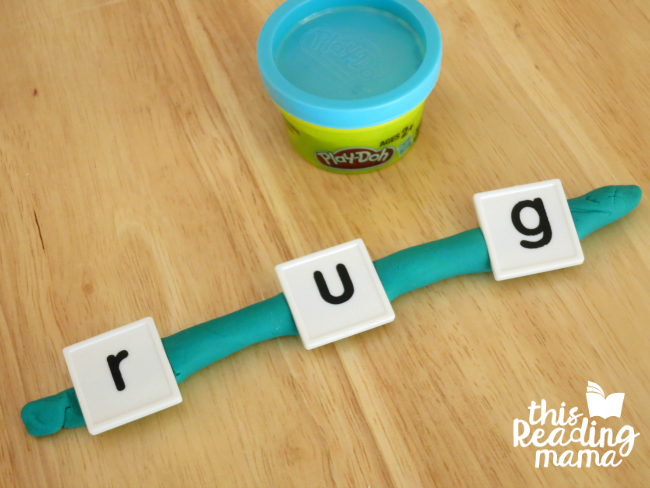 sounding out words with playdough snake and letter tiles
