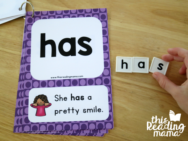 using letter tiles to spell words from first grade sight word sentence cards
