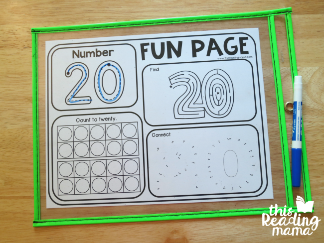 slip number fun pages into dry erase pocket to make them reusable